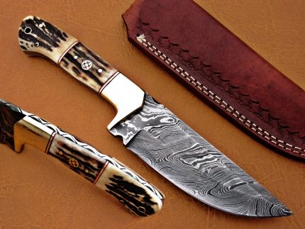 This awesome Damascus knife was designed and custom made by. There is no other knife like this, it was custom made only for you. This stunning unique knife not only looks great but it is also rock solid because of robust classic construction. Marvelous Damascus blade of the knife is the result of hours and hours of forging This knife is complete with a top quality extra thick leather sheath. The leather sheath is totally hand tooled and sewn. Extra thick leather and strong stitching make this sheath robust which can withstand years of rough and tough use. PAYMENT: PAY PAL PAYMENTS ONLY. DELIVERY: Customer will receive item two weeks after receiving item COURIER : WE ARE USING DHL FIRST CLASS 2-3 DAYS. AGE RESTRICTION: WE DON'T SELL KNIVES TO ANY ONE WHO IS UNDER AGE 18. GUARANTEE: IF YOU ARE NOT HAPPY WITH YOUR PURCHASE, WE OFFER YOU A PEACE OF MIND GUARANTEE IF YOU RETURN THE PRODUCT WITHIN 14 WORKING DAYS. WE WILL REFUND YOUR MONEY BACK IMMEDIATELY ON RECEIVING THE KNIFE BACK IN ORIGINAL CONDITION. DELIBERATE TAMPERING WITH THE PRODUCT OR MISUSE WILL NOT QUALIFY FOR THE REFUND. SHIPPING CHARGES ARE NON-REFUNDABLE. DISCLAIMER: WHEN YOU ARE BIDDING ON THIS KNIFE YOU ARE CONFIRMING US THAT YOUR AGE QUALIFIES FOR THIS PURCHASE AND THIS IS A LEGAL PURCHASE.ANS KNIVES TAKES NO RESPONSIBILITY FOR ANY ILLEGAL PURCHASE. ANSKNIVES IS ALSO NOT RESPONSIBLE FOR INJURY, DEATH OR CRIMINAL ACTS DUE TO THE MISUSE OF OUR PRODUCT. ANSKNIVES IS ALSO REQUEST TO OUR ALL CUSTOMERS, PLEASE WATCH YOUR SELF AT THE TIME OF HANDLING AND USING KNIVES AND ALSO AT THE TIME, WHEN YOU PUT IN OR OUT KNIFE IN LEATHER SHEATH(POUCH) SHARP TIP OF CURVED KNIFE (SPECIALLY HUNTING KNIFE) CAN ACROSS AND COME OUT FROM SHEATH AND INJURE YOUR HAND. SRKNIVES TAKE NOT RESPONSIBLE ON THIS ACCIDENTS. "YOU CAN GIVE US ORDER OF THAT KNIFE IN ANY QUANTITY" IN ORDER WE WILL GIVE YOU SPECIAL DISCOUNT IN EACH KNIFE AND SHIPPING PRICE WILL ALSO BE COMBINED FOR GIVING ORDER,PLEASE MESSAGE US AT EMAIL.WE WILL REPLY YOU AS SOON AS POSSIBLE